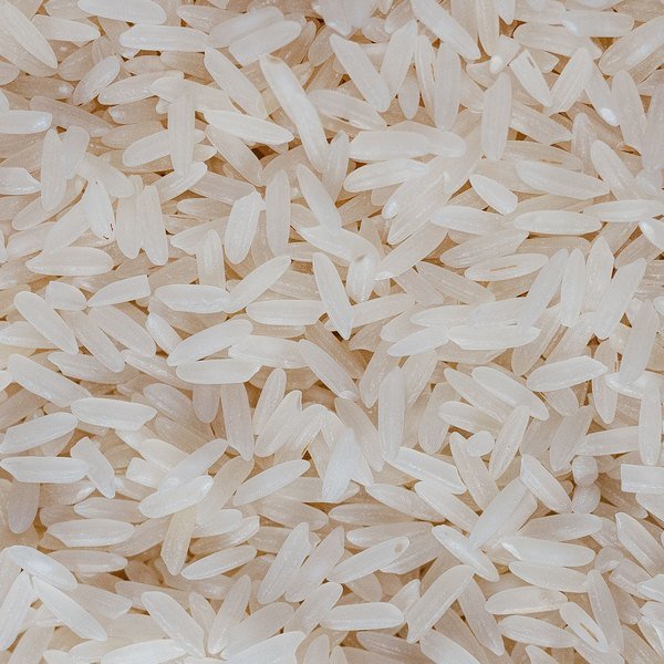 Close-up of uncooked white rice grains