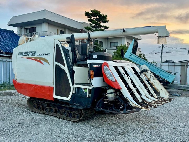 Kubota ER572 combine harvester parked on a gravel yard