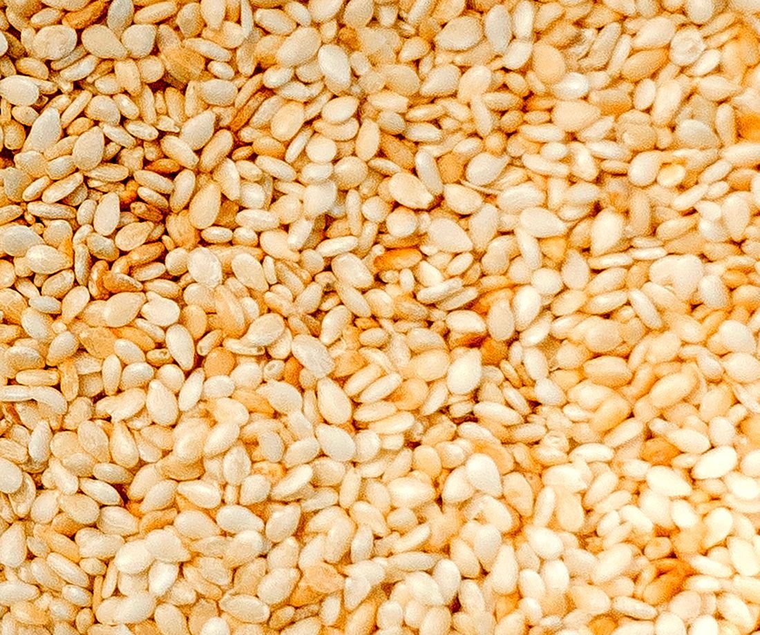 Hulled sesame seeds in a tray